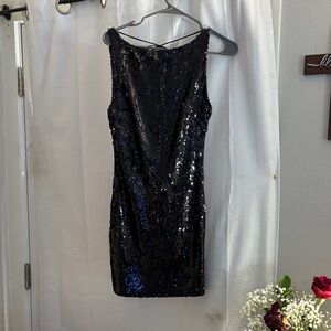 Black Boatneck Sequin mini Dress
Never worn